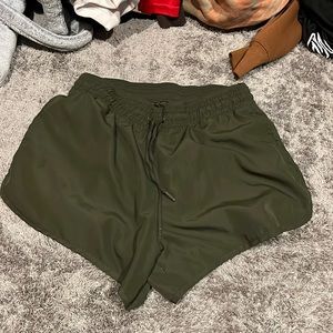 Green athletic shorts